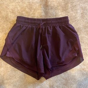 HALARA High-Rise Contrast Mesh Drawstring 2–in-1 Side-Split Shorts